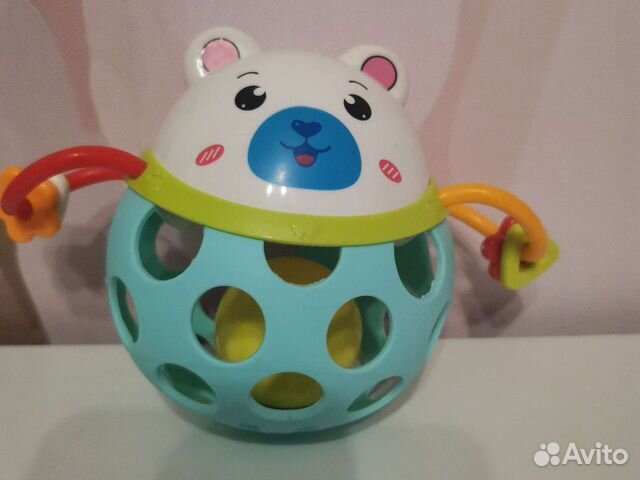Развивающие игрушки. Погремушка-прорезыватель