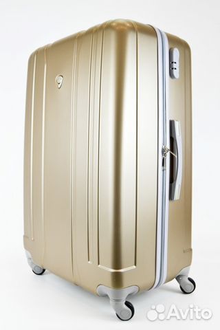 Чемодан цвета золота на 4х колесиках размера XL Чемодан цвета золота на 4х колесиках размера XL