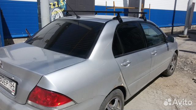 Багажник на крышу для автомобиля Митсубиси Лансер