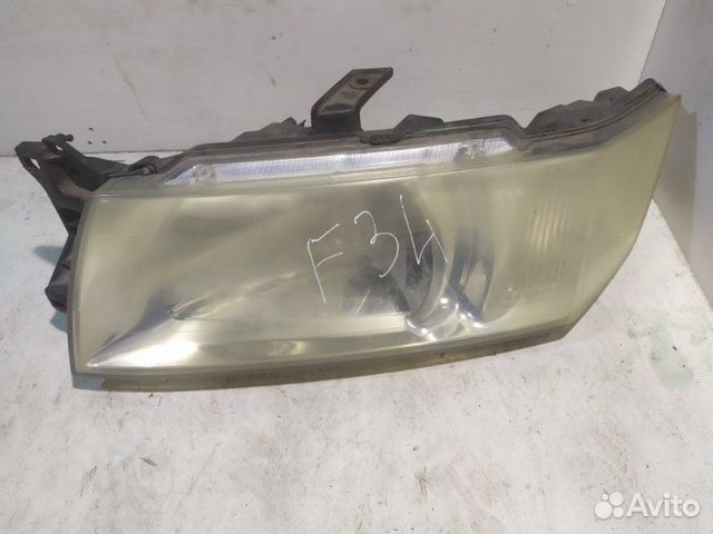Фара левая Mitsubishi Chariot Grandis N84W Фара левая Mitsubishi Chariot Grandis N84W