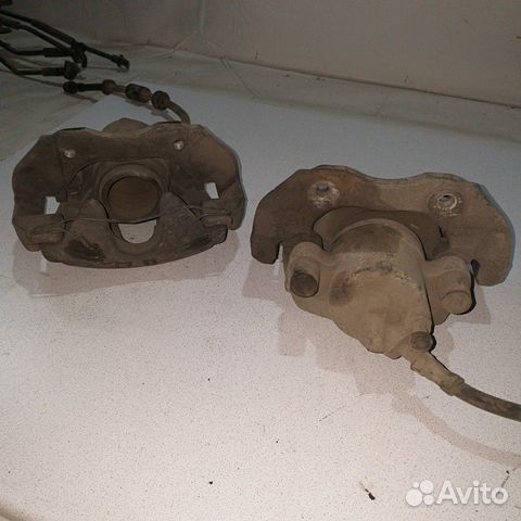 Суппорт тормозной передний правый левый Ford Focus