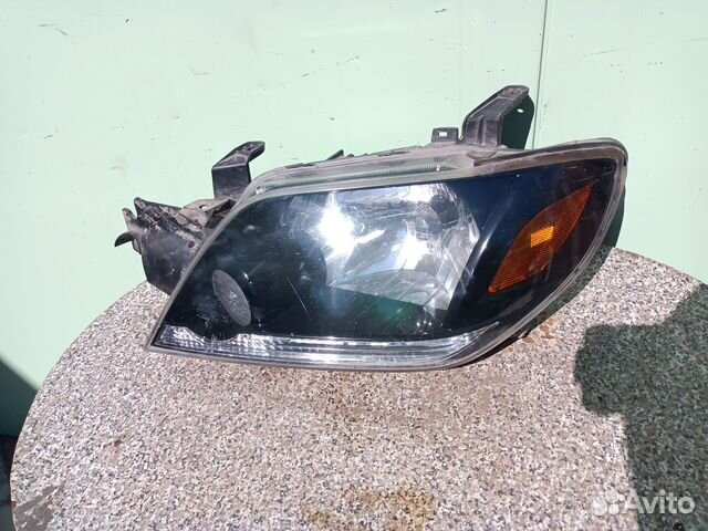 Фара левая Митцубиси Аутлендер (CU) 2001-2008