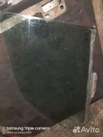 Стекло двери перед левая Daewoo Nexia