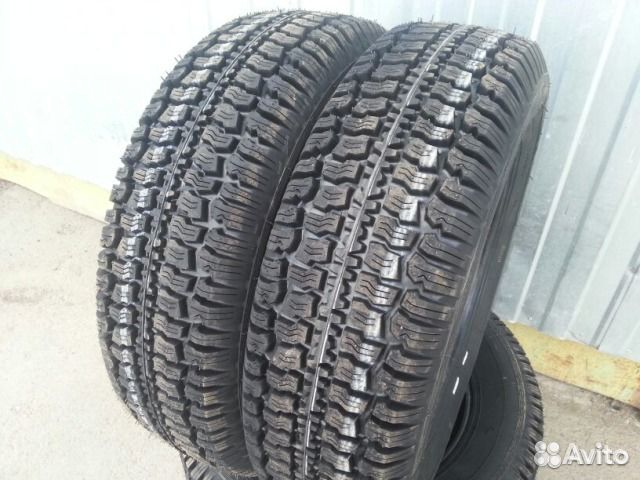 Кама всесезонка r16. Кама-Flame 205/70 r16. 205/70r16 Кама Flame 91q. Кама Флейм 205/70/16 на ниву. Кама Флейм 215/65 r16.