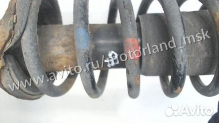 Амортизатор подвески левый передний Mazda Demio, 2