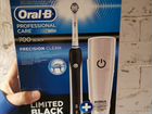 Электрическая зубная щетка Oral B 700 black, новая