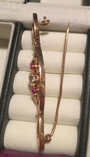 Эксклюзивная полувековая золотая брошь и кольца