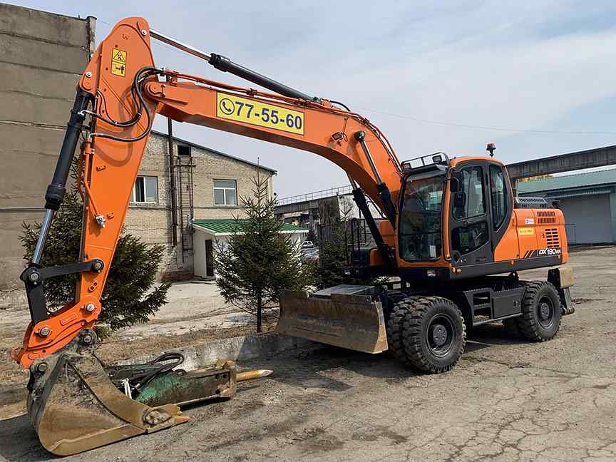 Экскаватор хабаровск. Doosan 160w экскаватор. Doosan dx160. Экскаватор колесный Doosan 160w. Колесный экскаватор 160 w Sinomach.